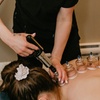 Image 1: Pamper Her: 60-Minute Therapeutic Massage + Face Massage or Cupping 