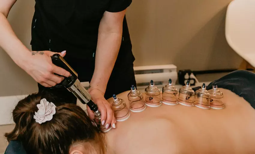 Pamper Her: 60-Minute Therapeutic Massage + Face Massage or Cupping 