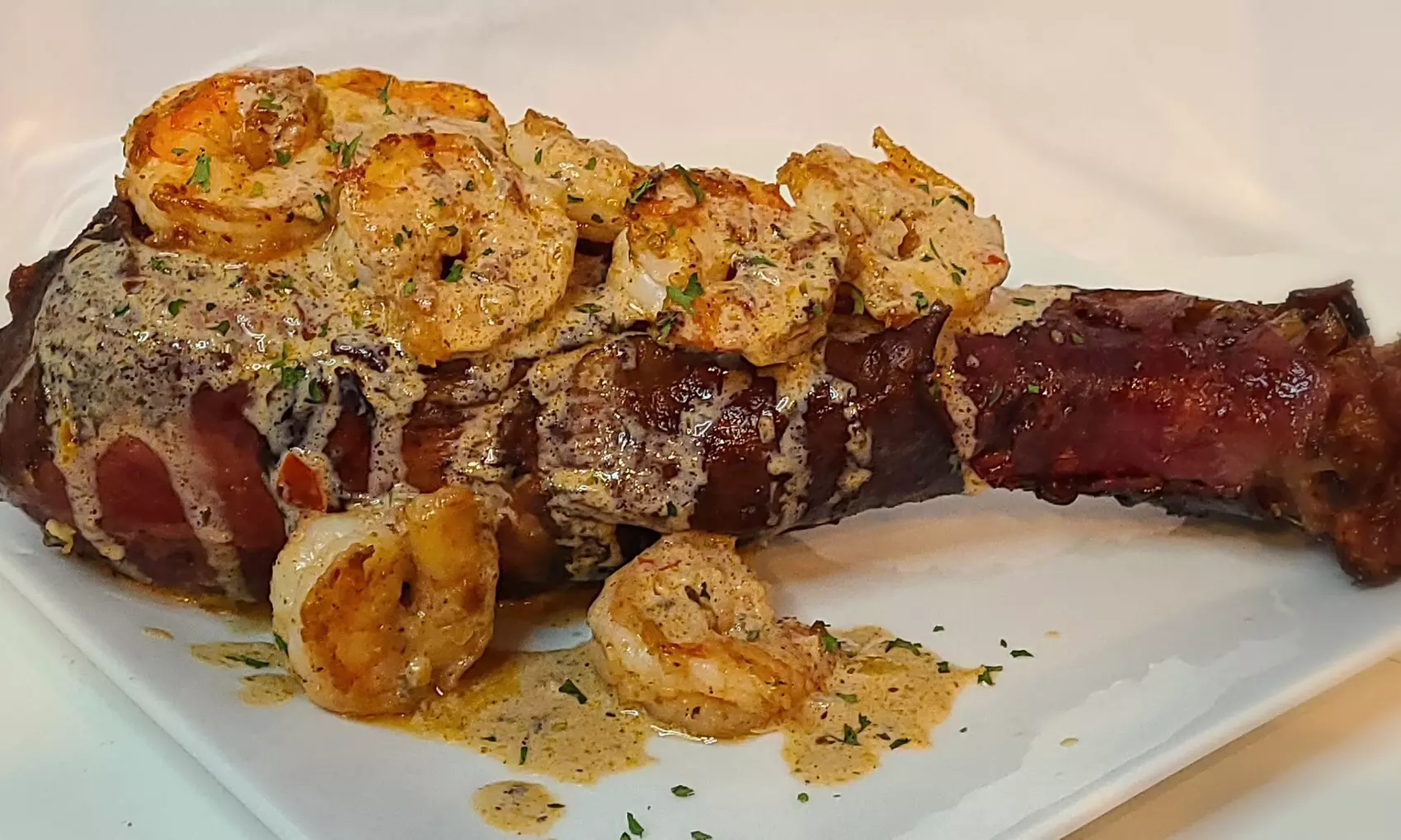  $20, $50, or $100 Toward Caribbean - American Food at Tropikal Bird Turkey Legs (Up to 26% Off) (Up to 26% Off) - Primary Image
