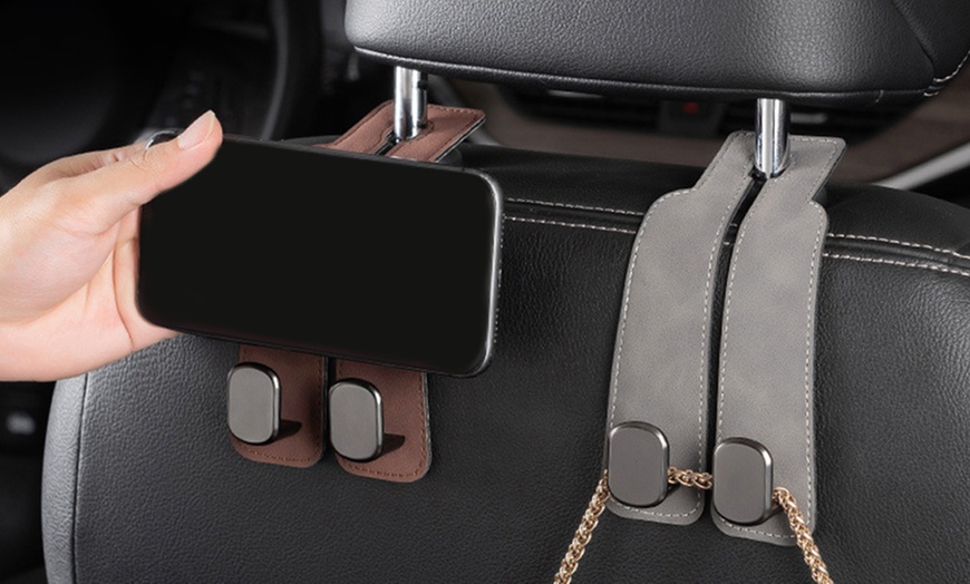 Image 10: Two or Four Pieces of Car Headrest Storage Hanging Hooks Set