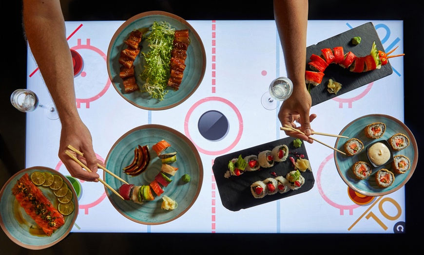 Image 3: Experience Gourmet Dining with Interactive Tables and 20+ Games