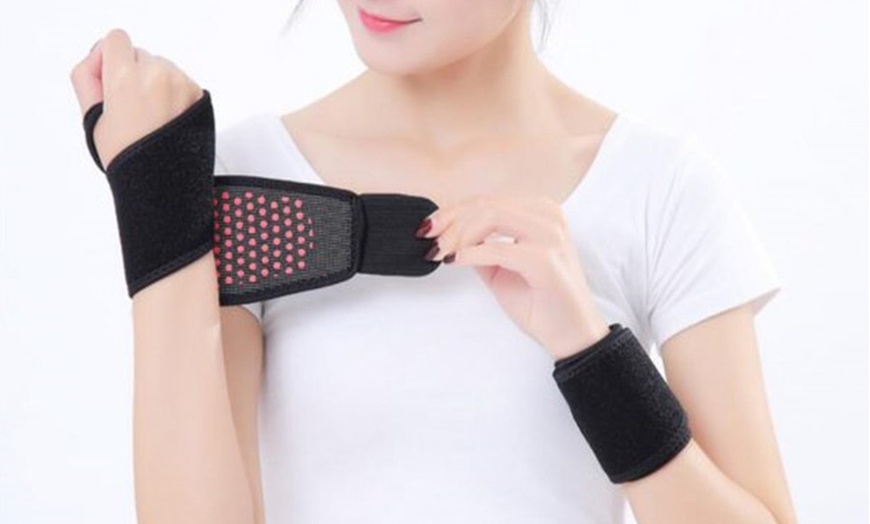 Image 1: Arthritis Self-Heating Wrist Wrap