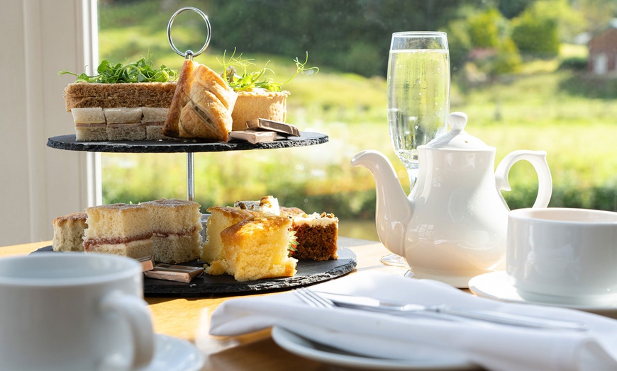 Image 1: Canal-Side Delight: Afternoon Tea for 2 or 4 with Optional Prosecco 