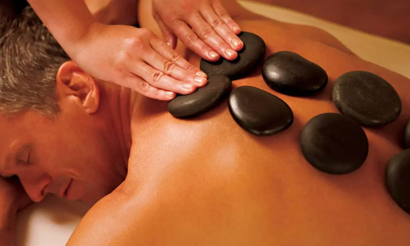60-Minute Hot Stone Massage with Optional 20-Minute Red Light Therapy