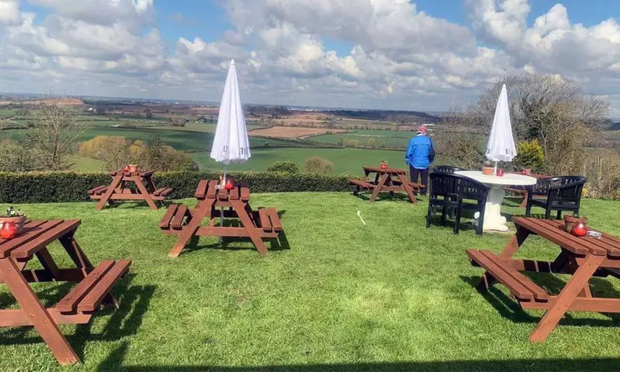 Choice of any Burger with Fries and Beer for One, Two, or Four