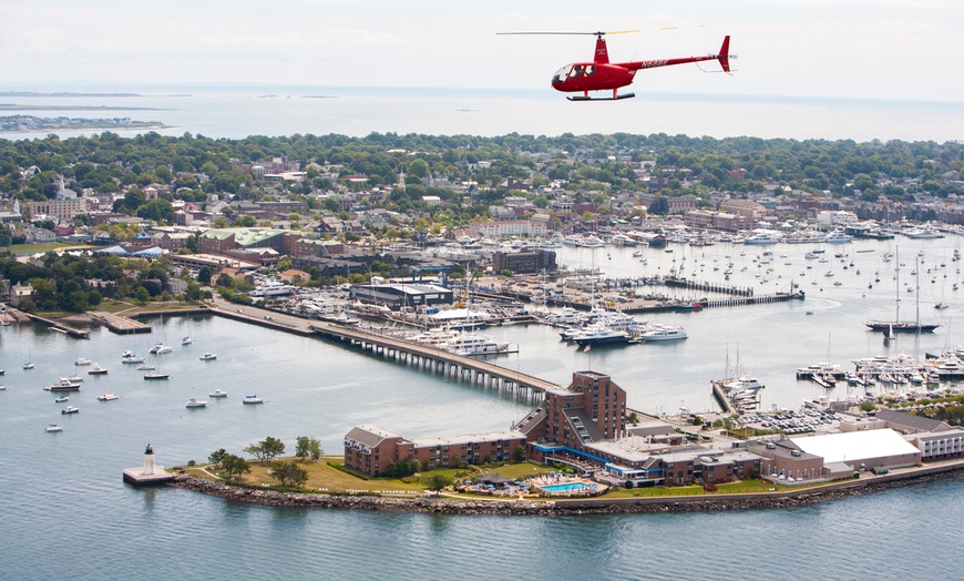 Image 6: Guided helicopter tour with breathtaking views of famous mansions