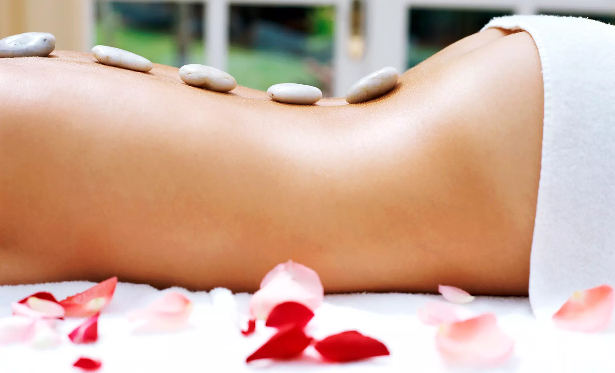 One-Hour Swedish, Hawaiian, or Hot-Stone Massage at Elisabeth Salon and Spas (Up to 54% Off) - Primary Image