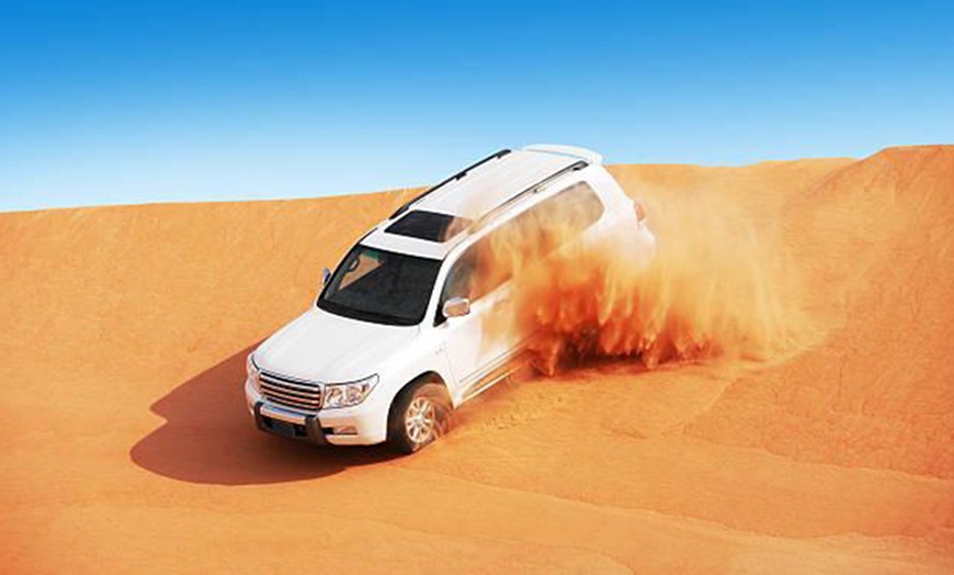 Image 1: VIP Red Dune Desert Safari or Premium Desert Safari for 1, 2, or 4