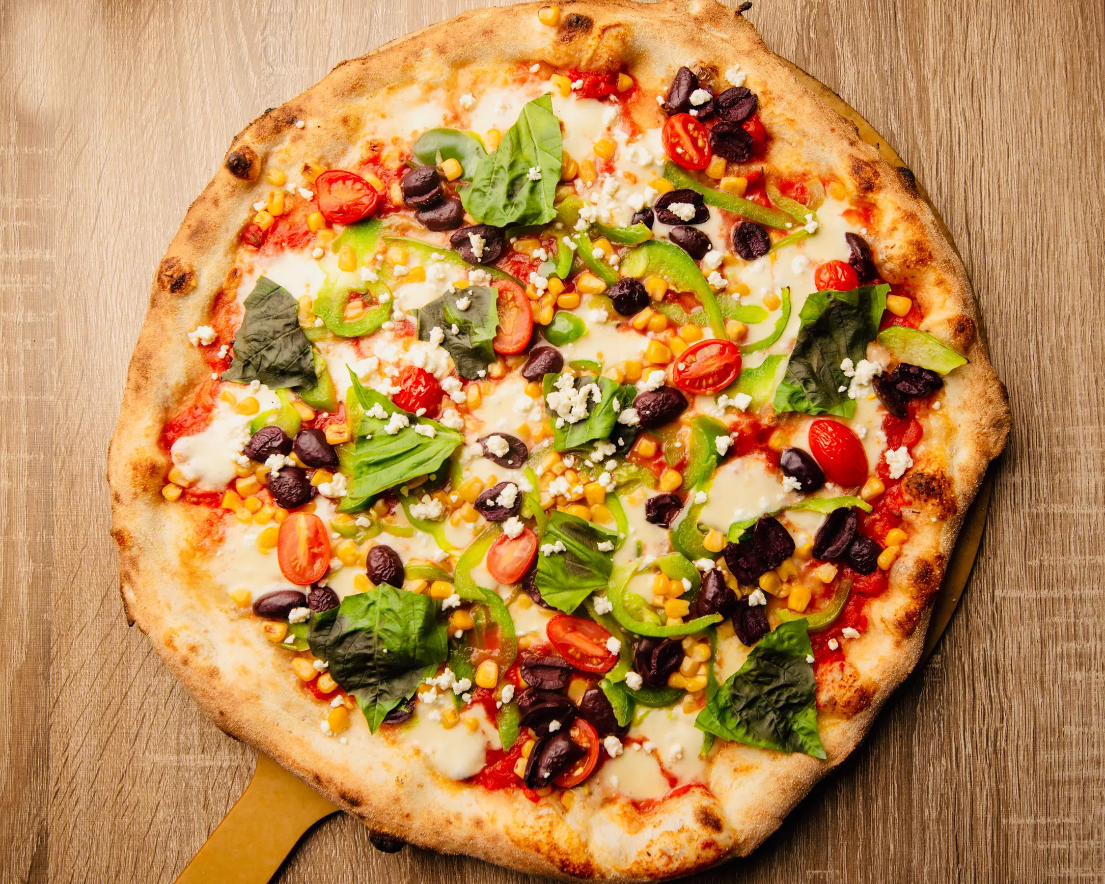 Two-Topping Pizzas or C$12 for C$20 Worth of Food and Drinks at Captain's Oven Pizza. 3 Options Available. - Primary Image