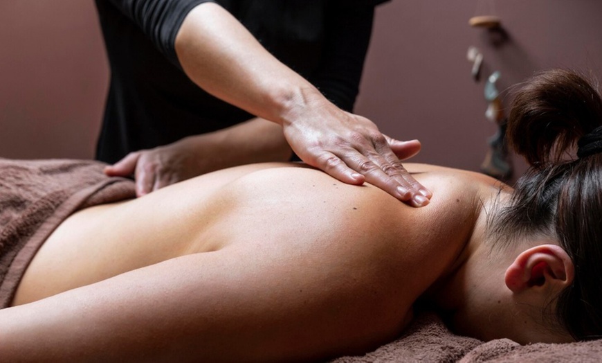 Image 3: Relax w/ 60-Min Tailored Massage, Deep Tissue with Optional Hot Rocks 