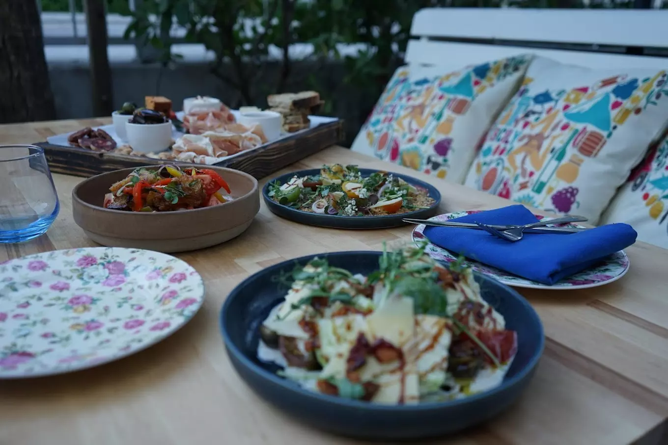 $50 or $100 Toward Food & Drink or Pasta Dinner with Wine for Two or Four at Casa Isola Osteria (Up to 32% Off) - Primary Image