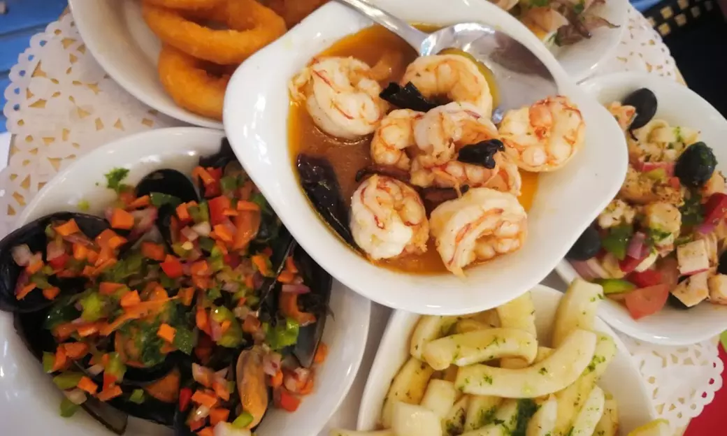 Festín de sabores: menú de mariscada o parrillada de carne para 2 o 4