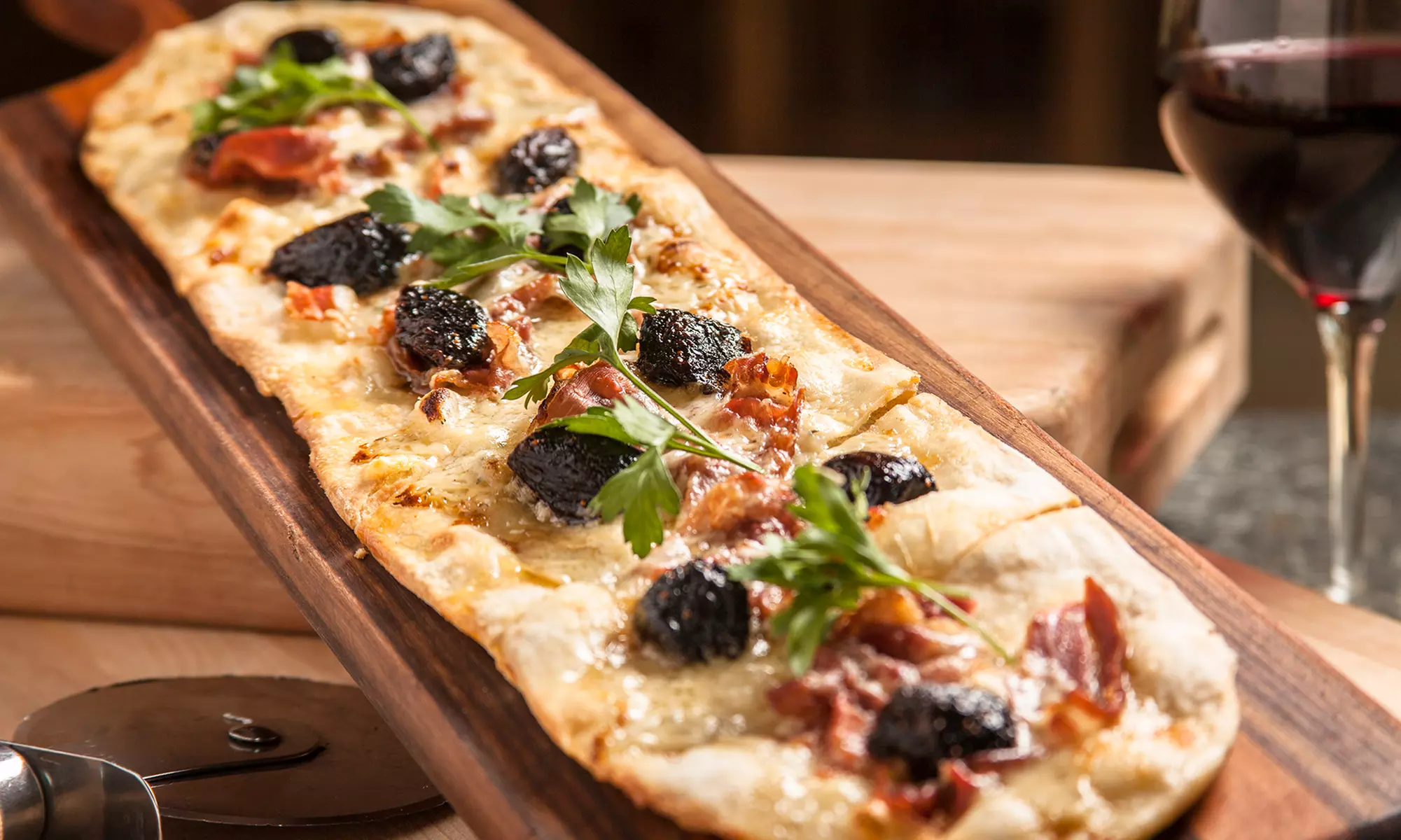 American and Italian Food and Drink at Pinstripes Oak Brook (Up to 25% Off). Two Options Available.  - Primary Image