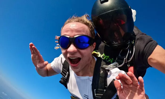 Jump into Excitement with Tandem Skydiving Jump from 7,500 Feet 