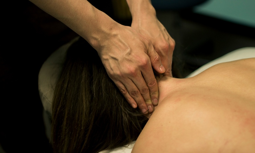 Image 1: 60-Minute Therapeutic Massage or 1-Month Table Stretch Session Package