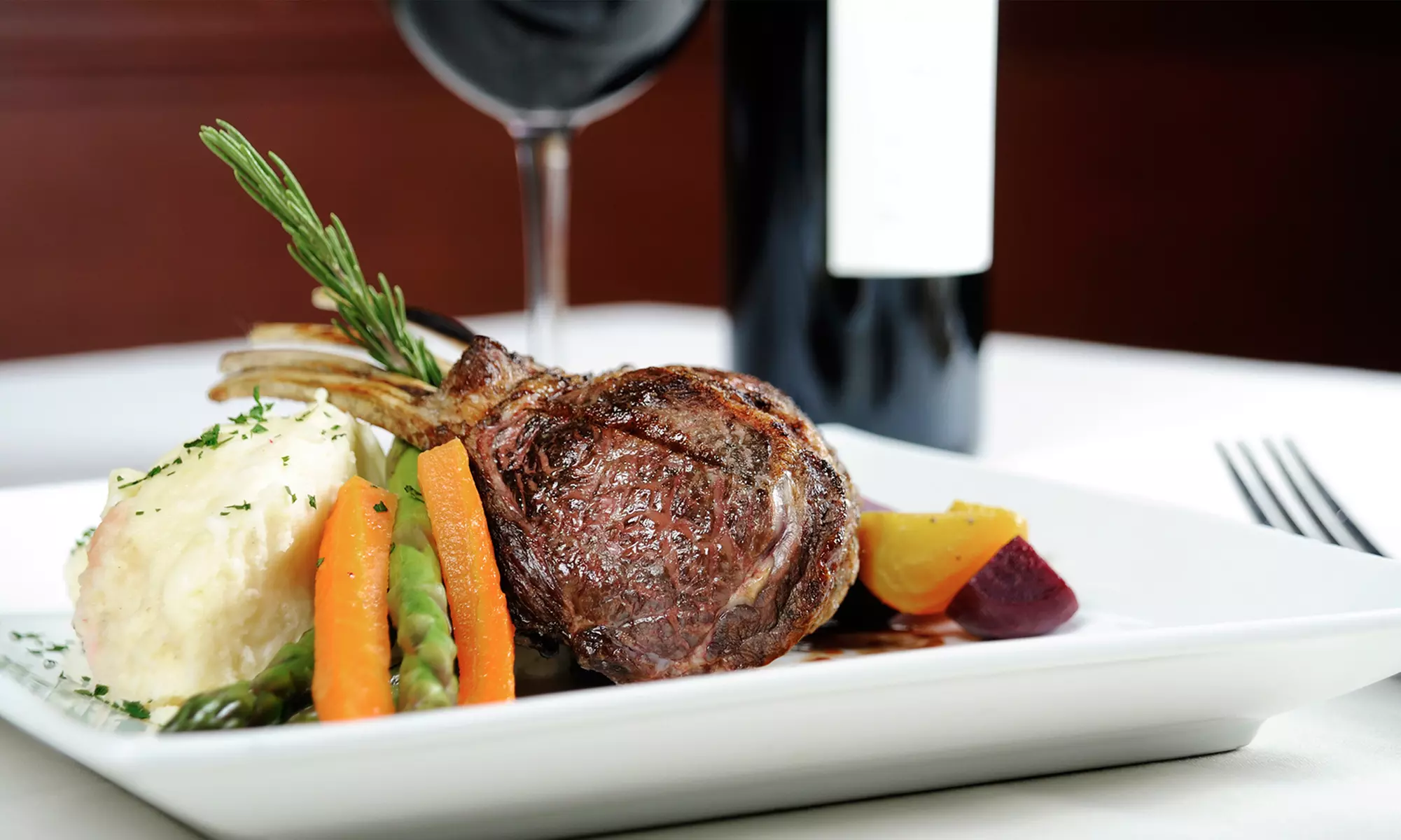 Steakhouse Cuisine for Two or Four, Valid Sunday through Thursday at One Eleven Grill (Up to 48% Off)  - Primary Image
