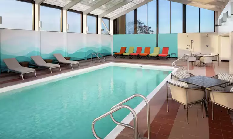 Modern 4-Star Stay w/ Pool, Dining, & SNHU Arena Convenience