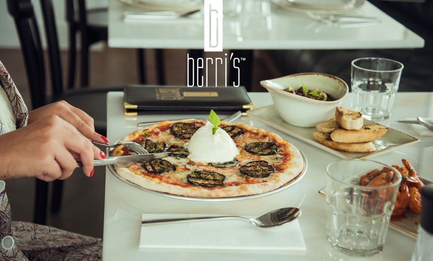 Image 8: Choice of large Pizza with soft beverage or House beverage at Berri's