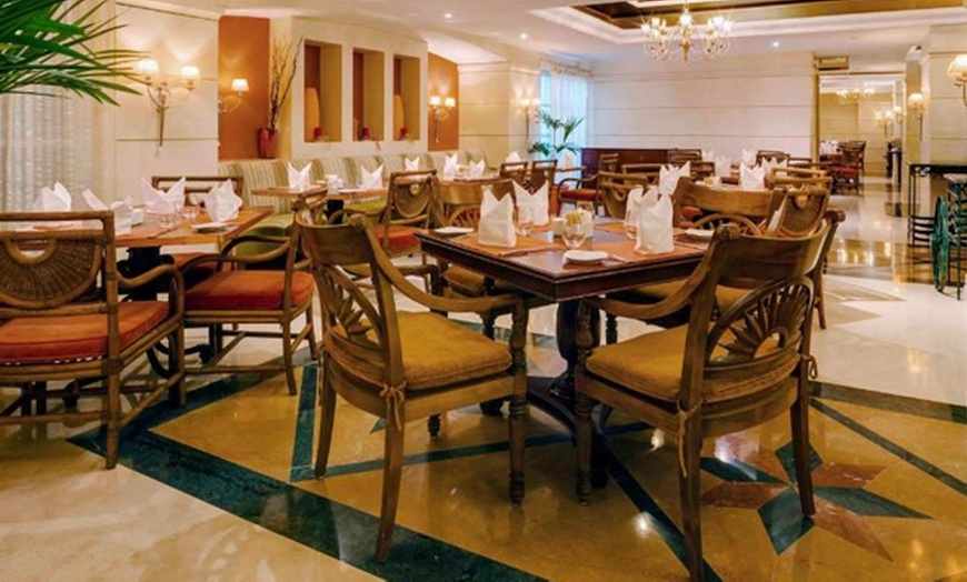 Image 2: Lunch or Dinner Buffet at 4* Novel Hotel:Child (AED 30) Adult(AED 64)
