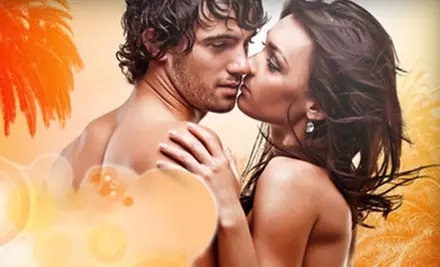 Five Bed Tanning Sessions or Two Mystic Spray Tans at Hollywood Tans. Seven Locations Available. - Primary Image