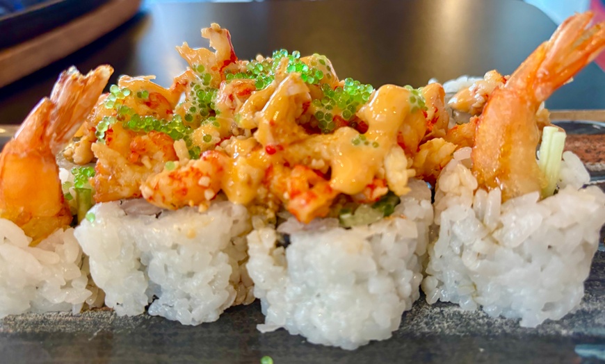 Image 2: Enjoy fresh Bluefin Tuna and Bakkafrost Salmon at a cozy sushi spot