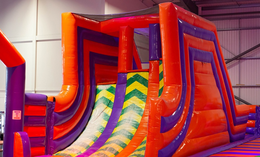 Image 4: Bounce into Fun: Inflatable Park Entry for Up to  Four People!