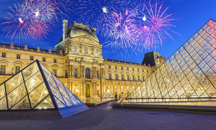 Image 1: Celebrate New Year Eve in Paris with a Guided Tour and River Cruise