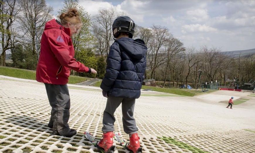 Image 1: Ski or Snowboard Lesson