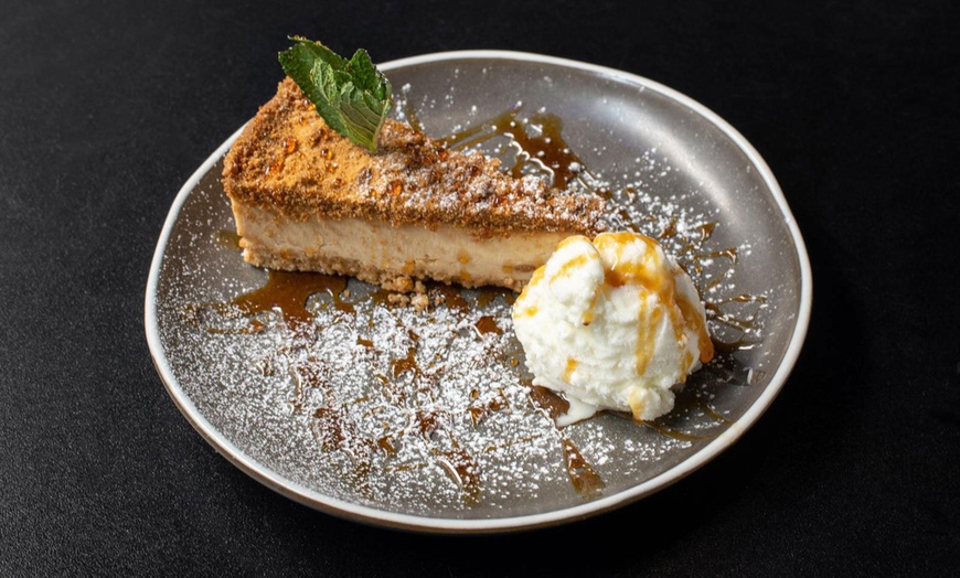 Image 10: 2 Course Meal with Drinks for 2-4 at Manhattan Bar & Grill