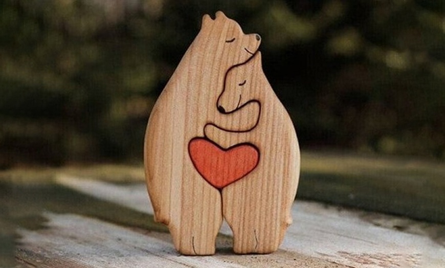 Image 1: Hand-Carved Animal in Love