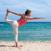 Image 1: Join a Drop-In for One Beach Yoga Class for One or Two People