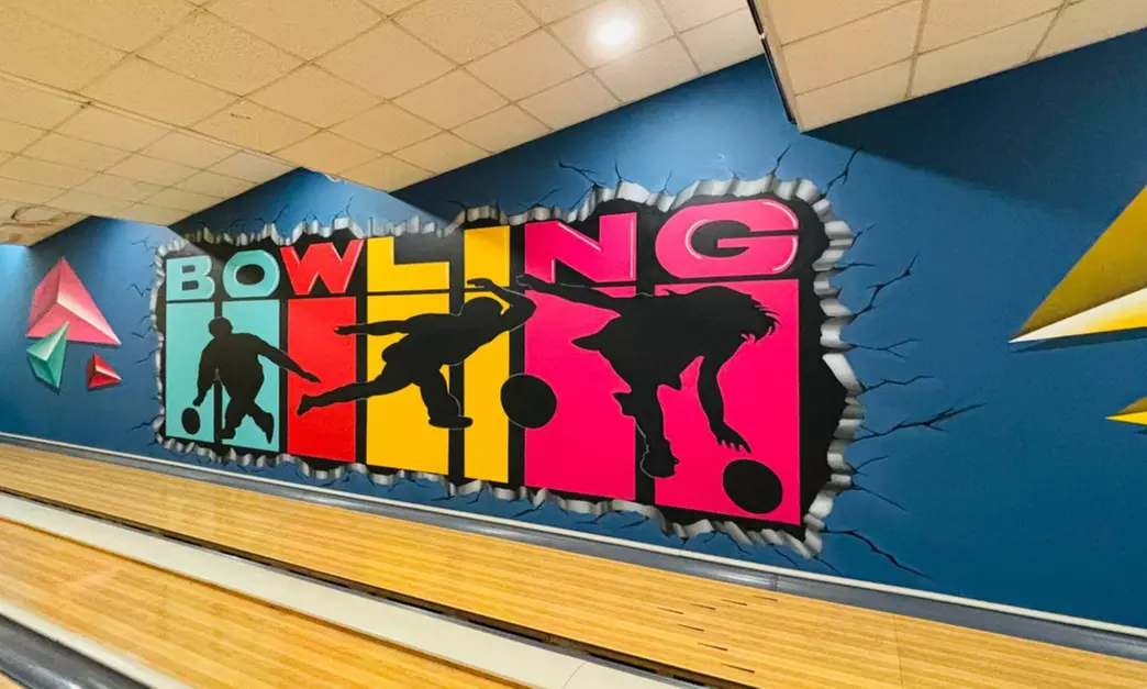 Partida de bolos con palomitas y bebida en Bowling Alcalá