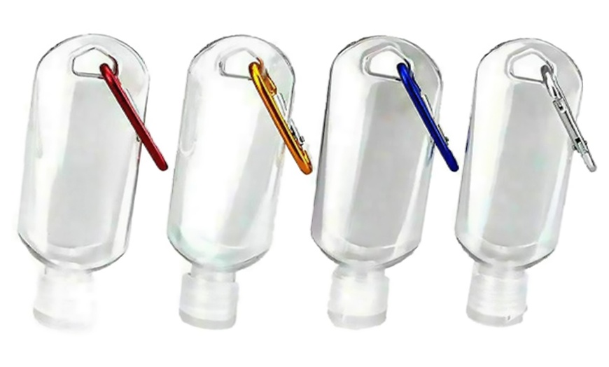 Image 1: Four Refillable Travel Bottles