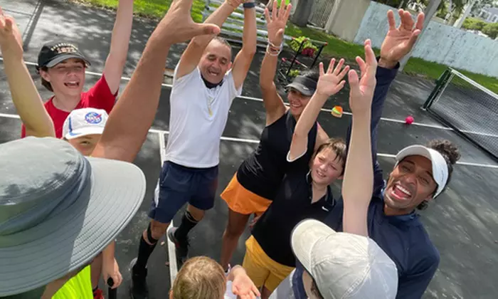 Ace Your Game with a Private Tennis Lesson for Up to Four