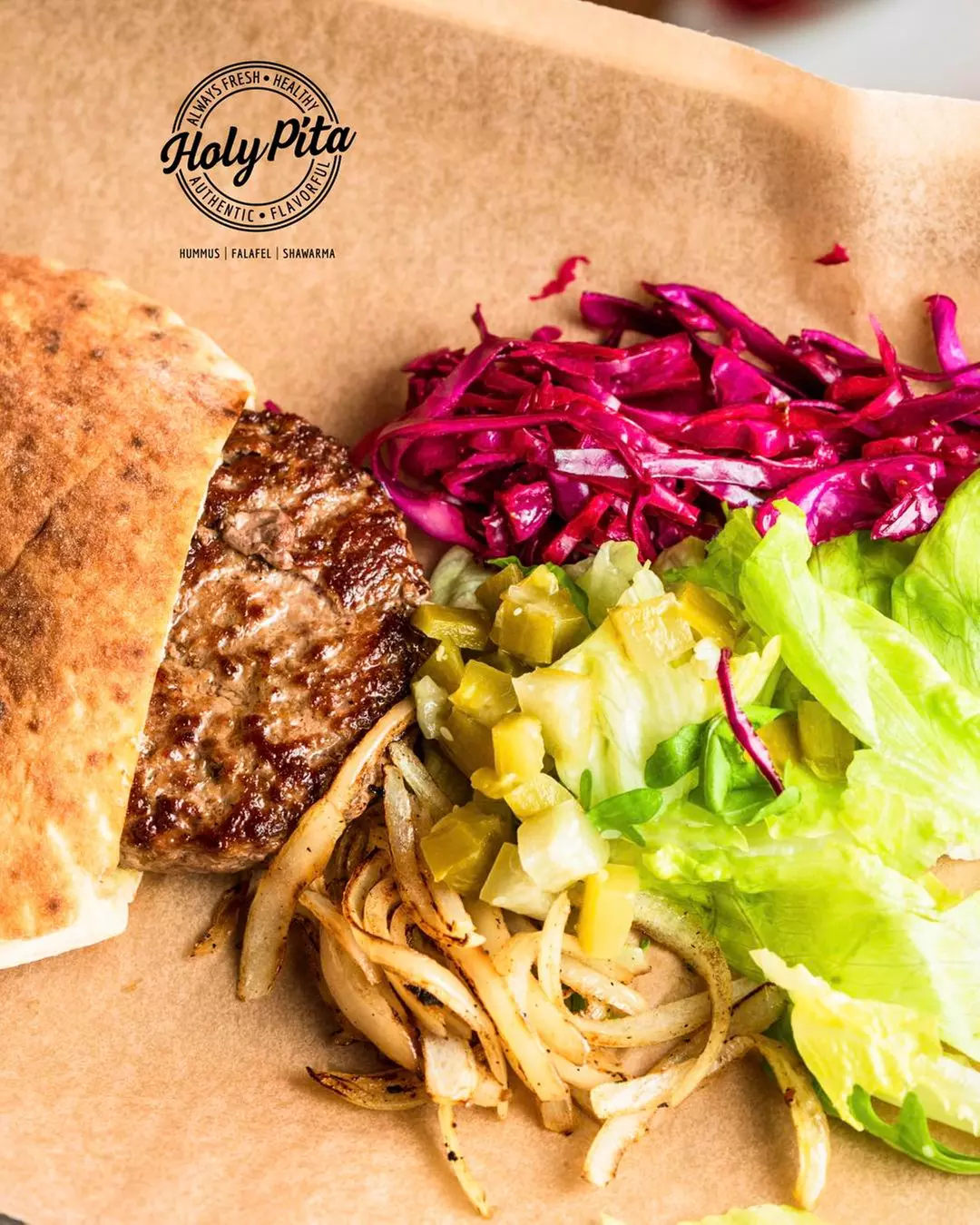 Authentic Mediterranean Delights Await: $30 or $60 to Use at Holy Pita