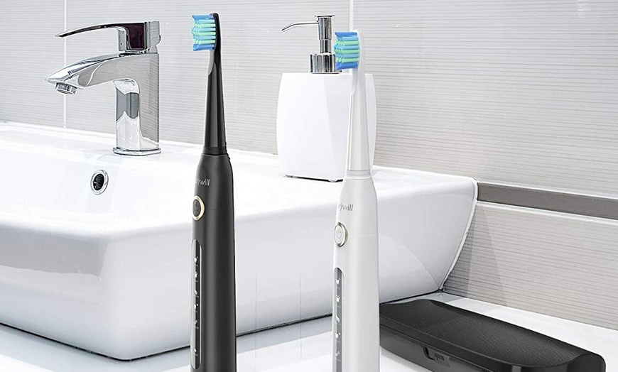 Image 2: Sonic Electric Toothbrush with Four or Eight Tooth Brush Heads