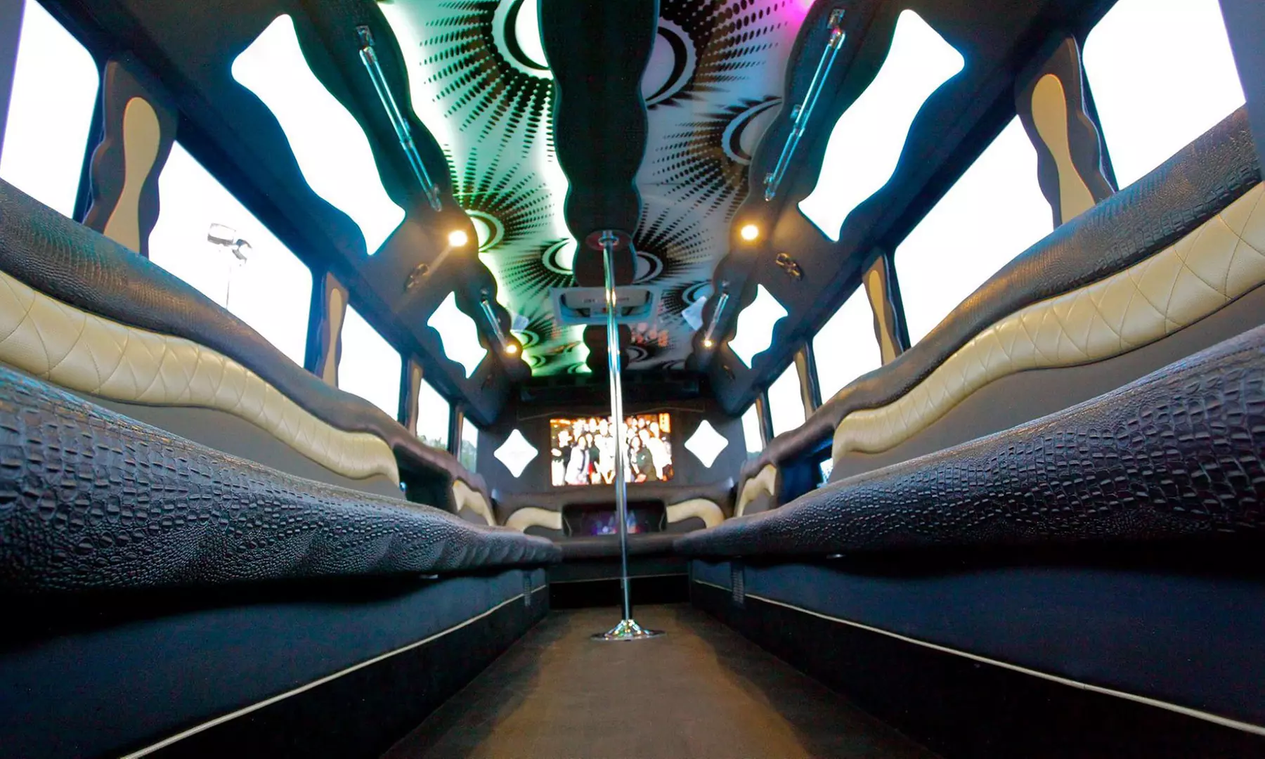 Three, Four, Six, or Eight-Hour Party Bus Rental or Pick-Up & Drop Off at Access Granted Chicago (Up to 62% Off) - Primary Image
