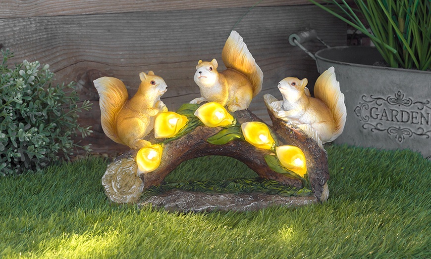 Image 7: One or Two Solar-Powered LED Illuminated Squirrels on Log Decorations