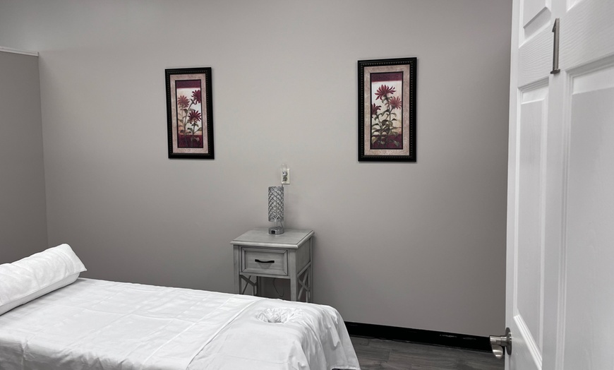 Image 3: Deluxe Full Body Massage with Choice of Hot Stone or Cupping Therapy