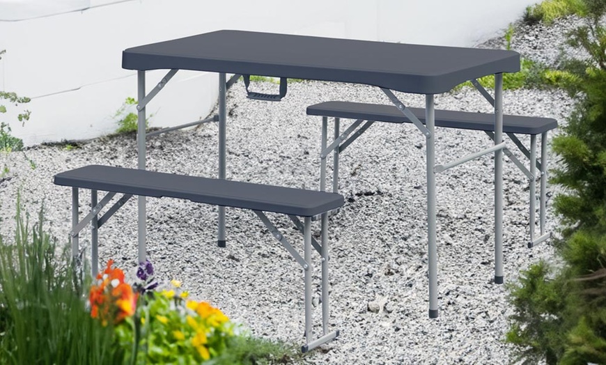 Image 1: Ensemble d'extérieur pliable comprenant une table et 2 bancs 