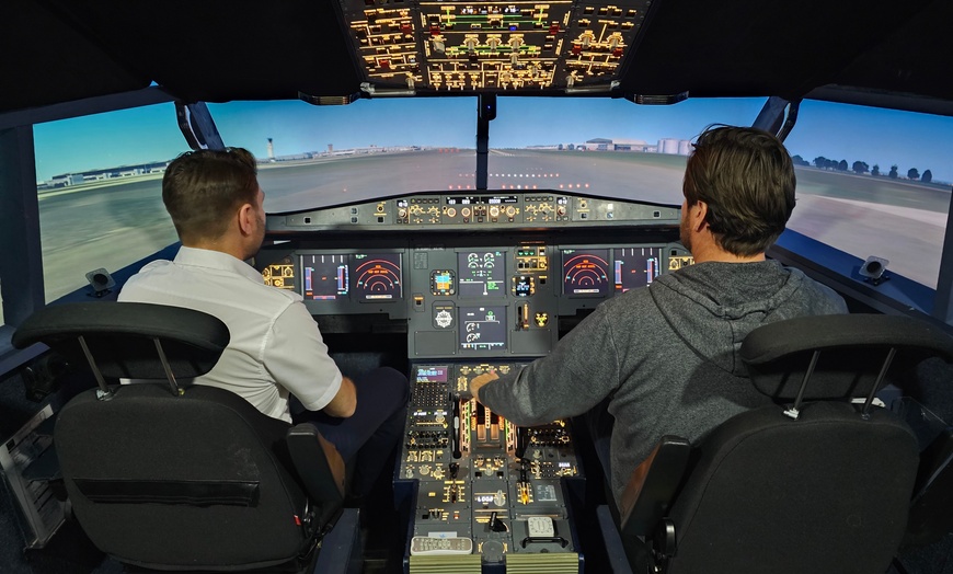 Image 1: Soar to New Heights with Thrilling Flight Simulator Experiences!