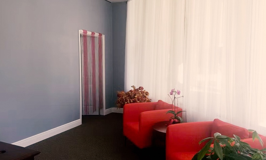 Image 6: Deep Tissue Hot Stone Massage with Walk-On-Back for One or Couples