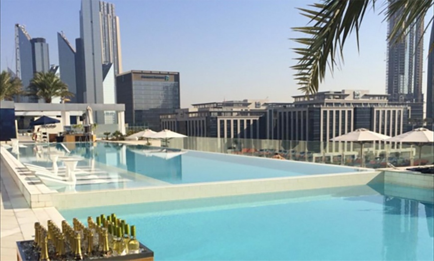 Image 1: Pool Access with Food Credit at 5* Sofitel Dubai Downtown