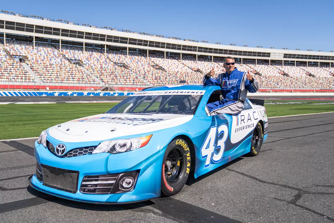 Feel the pace w/ 5-min track drive and action-packed NASCAR ride-along