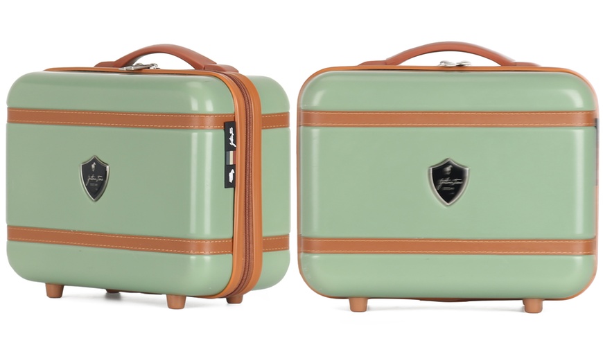 Image 20: Four Trolley Suitcases Set