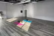 10-Class Pack or One Month of Unlimited Yoga Classes at Frontline Forward (Up to 52% Off) - Second Medium