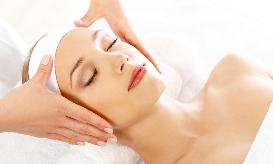 Image 1: Up to 50% Off on Massage - Specific Body Part (Hand, Neck, Head) at Luna Light Healing