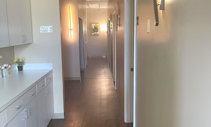 Image 9: Massages for 1 or 2 with Hot Towels, Organic Massage Oil and Lemon Tea