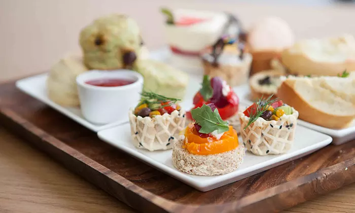 Afternoon Tea, Including Sandwiches, Scones, Tea & Desserts, for Two or Four at Capstone Tea & Fondue (50% Off)  - Primary Image