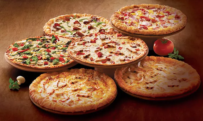 Pizza, Pasta, and Sandwiches at Domino's (Up to 47% Off). Three Options Available. - Primary Image